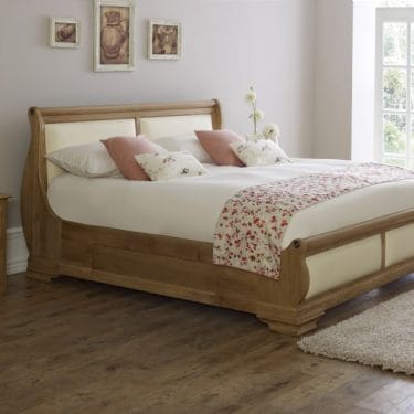Oak Sleigh Bed with Cream Leather and 3 Door Bedside Cabinet