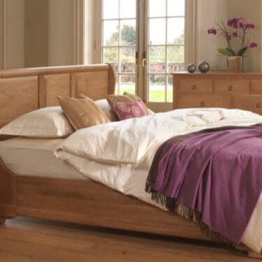 Monaco-Sleigh-Bed-in-Solid-Oak