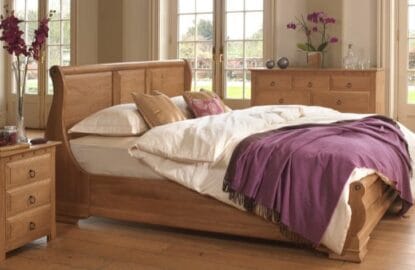 Monaco-Sleigh-Bed-in-Solid-Oak